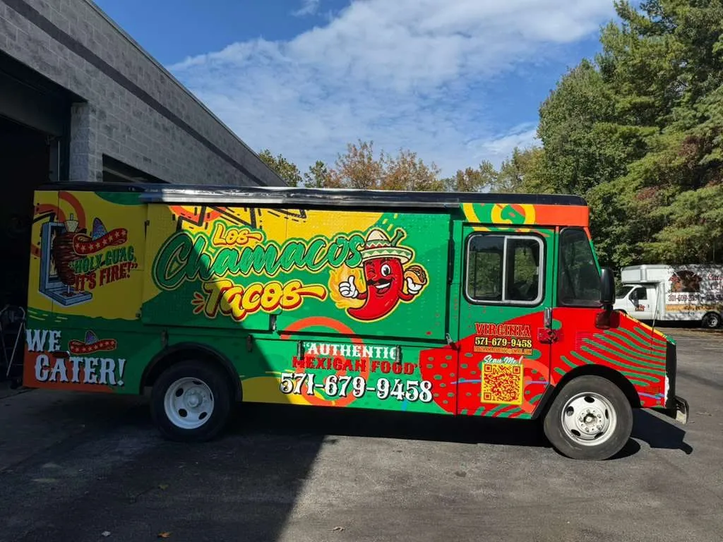 Los Chamacos Tacos food truck, side view, green and red wrap