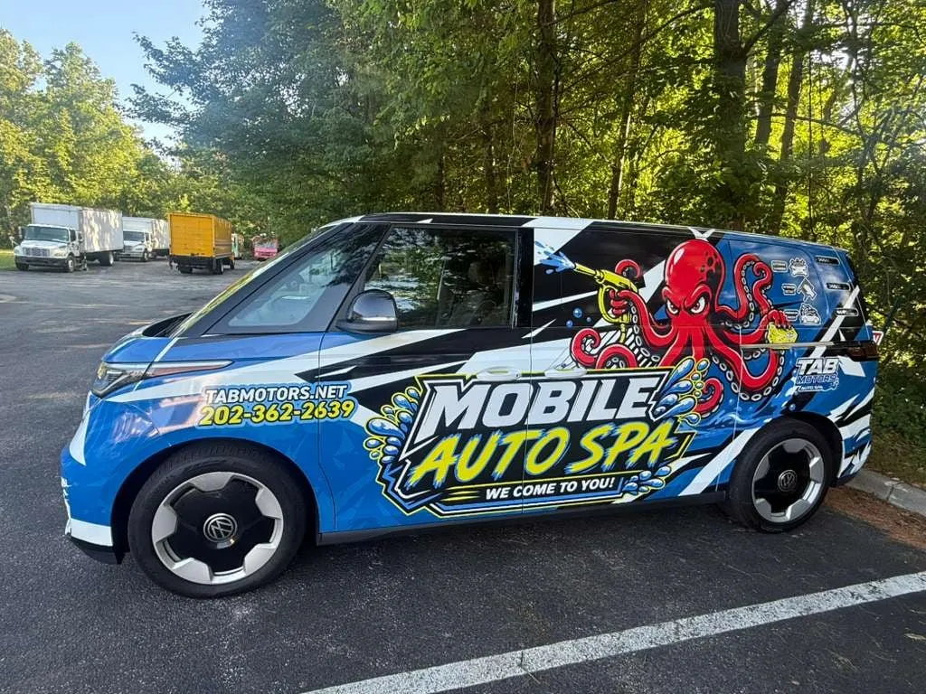 Mobile Auto Spa mobile detailing van with octopus mascot wrap, roadside