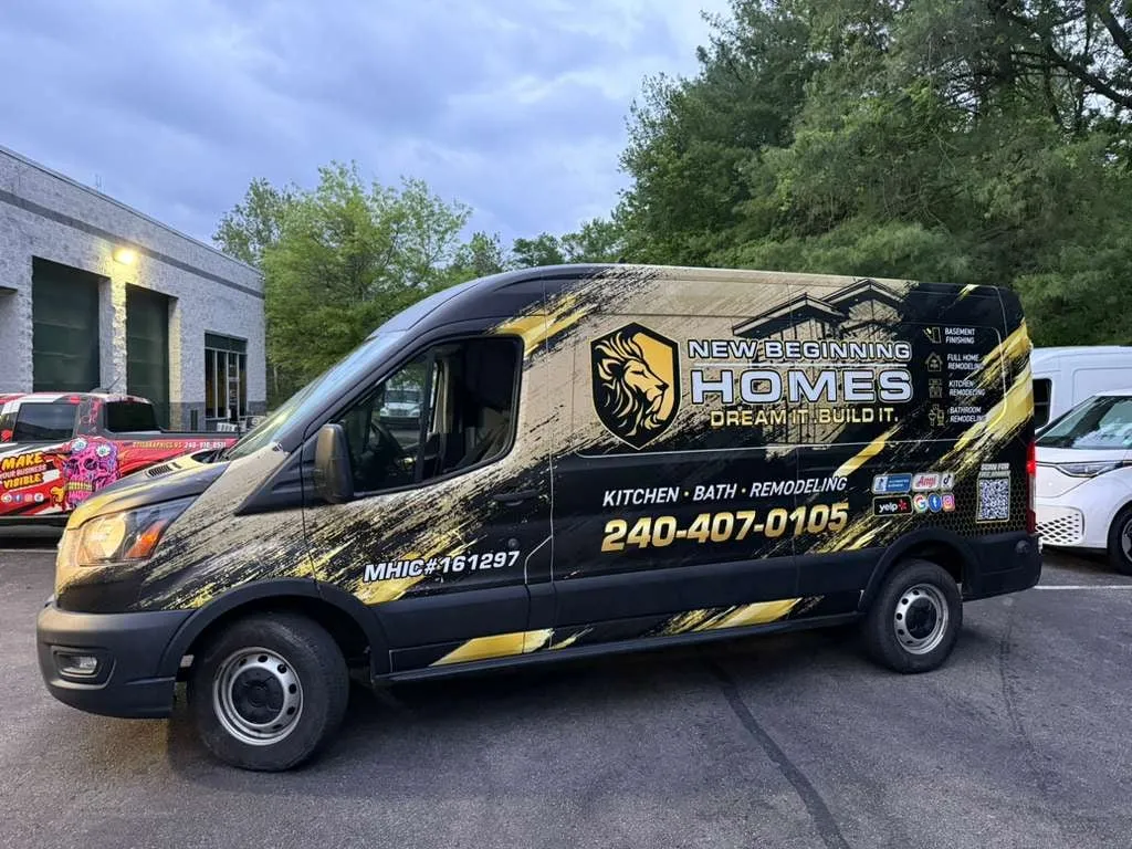 New Beginning Homes remodeling van with black and gold wrap