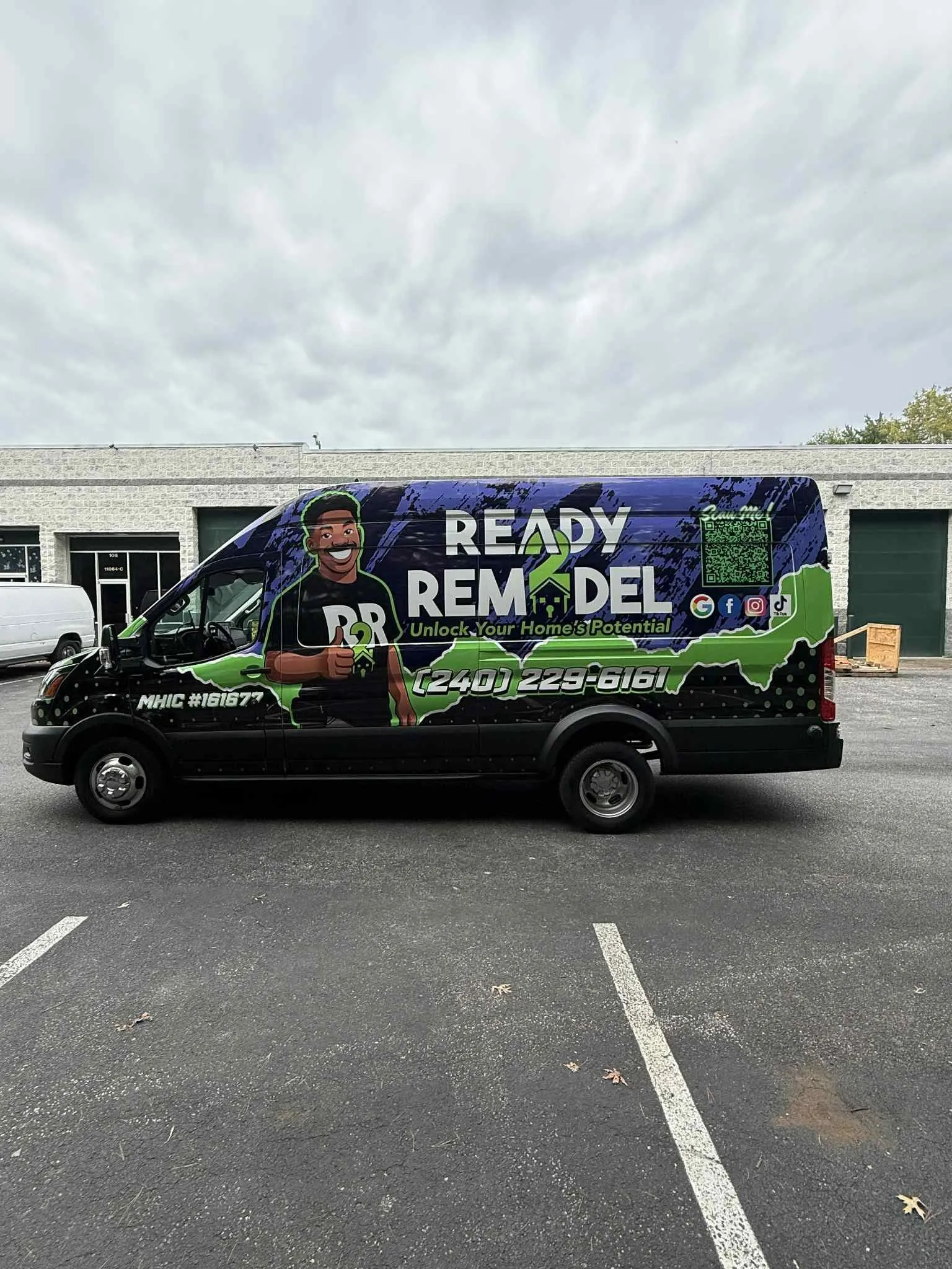 Ready 2 Remodel van with purple and green wrap