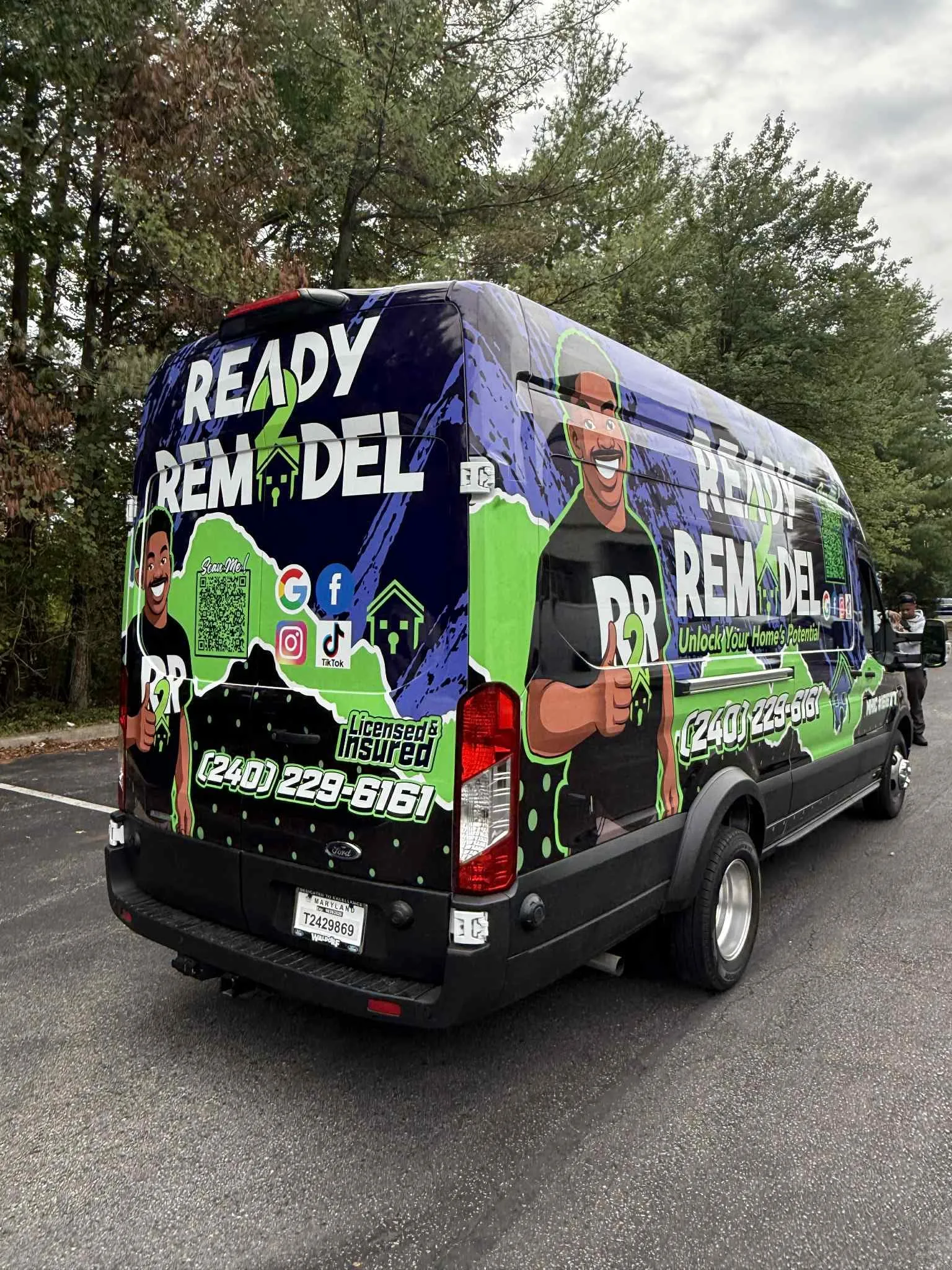 Ready 2 Remodel van, rear view, purple and green wrap
